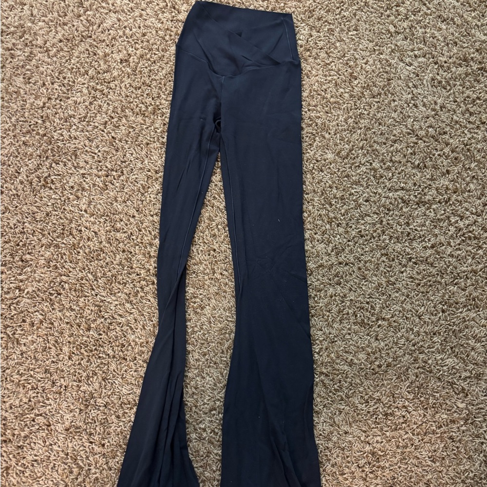 Black High-Waisted Leggings with tiny hole on the inside of knee